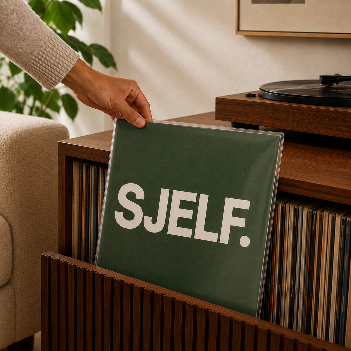 Beschermde groene vinyl albumhoes wordt bij de collectie opgeborgen