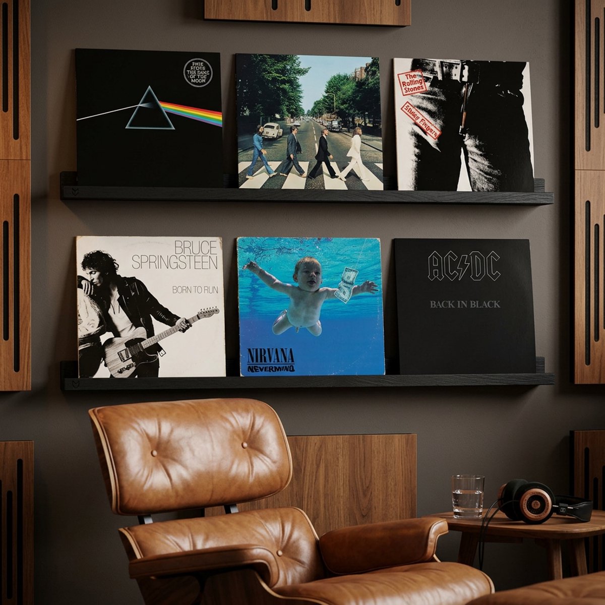 Zwarte zwevende plank met zes rockplaten, waaronder Pink Floyd en AC/DC.